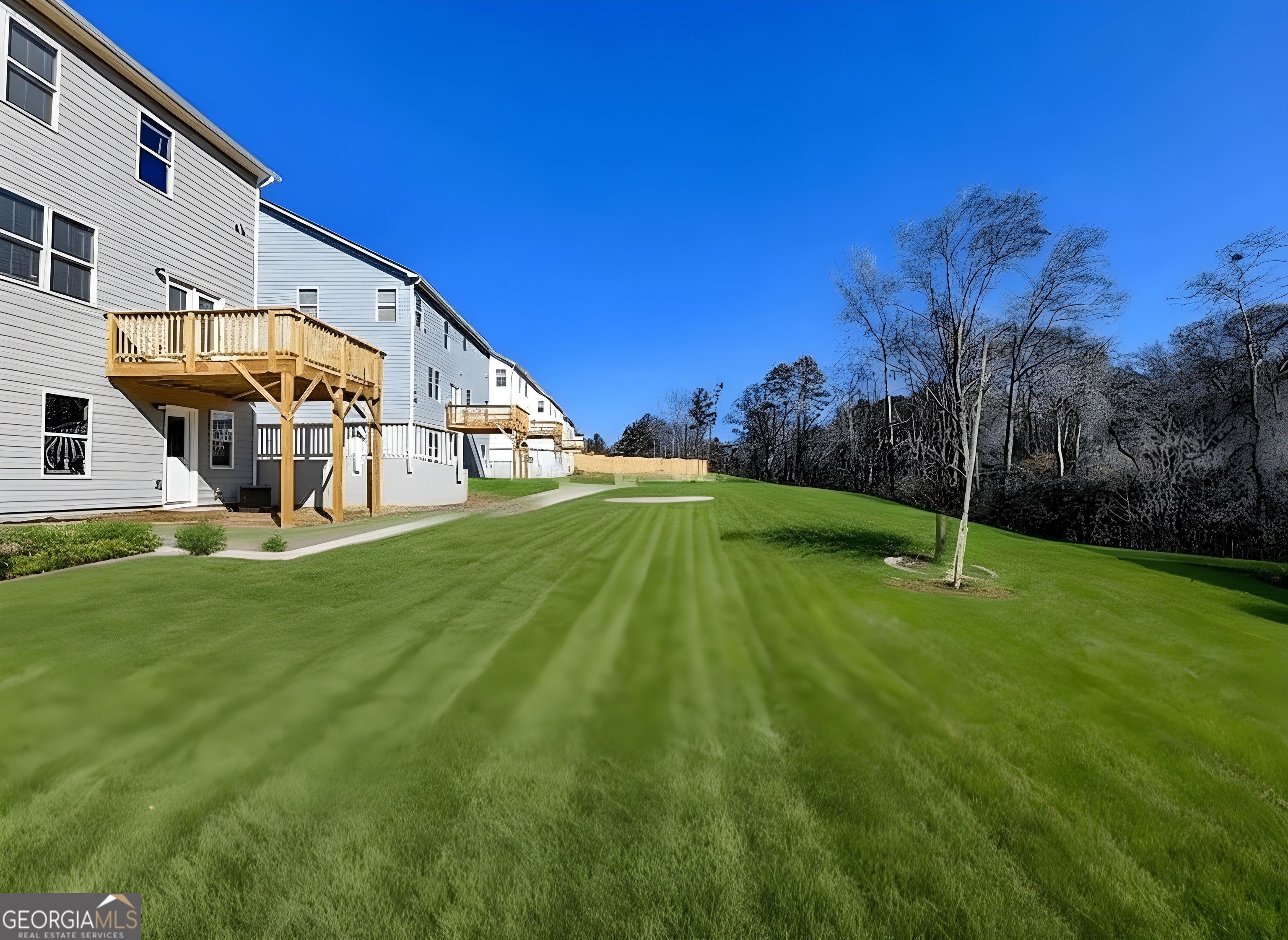 622 Brookfield Drive Braselton, GA 30517 - Photo 19 of 34 a view of a house with a yard
