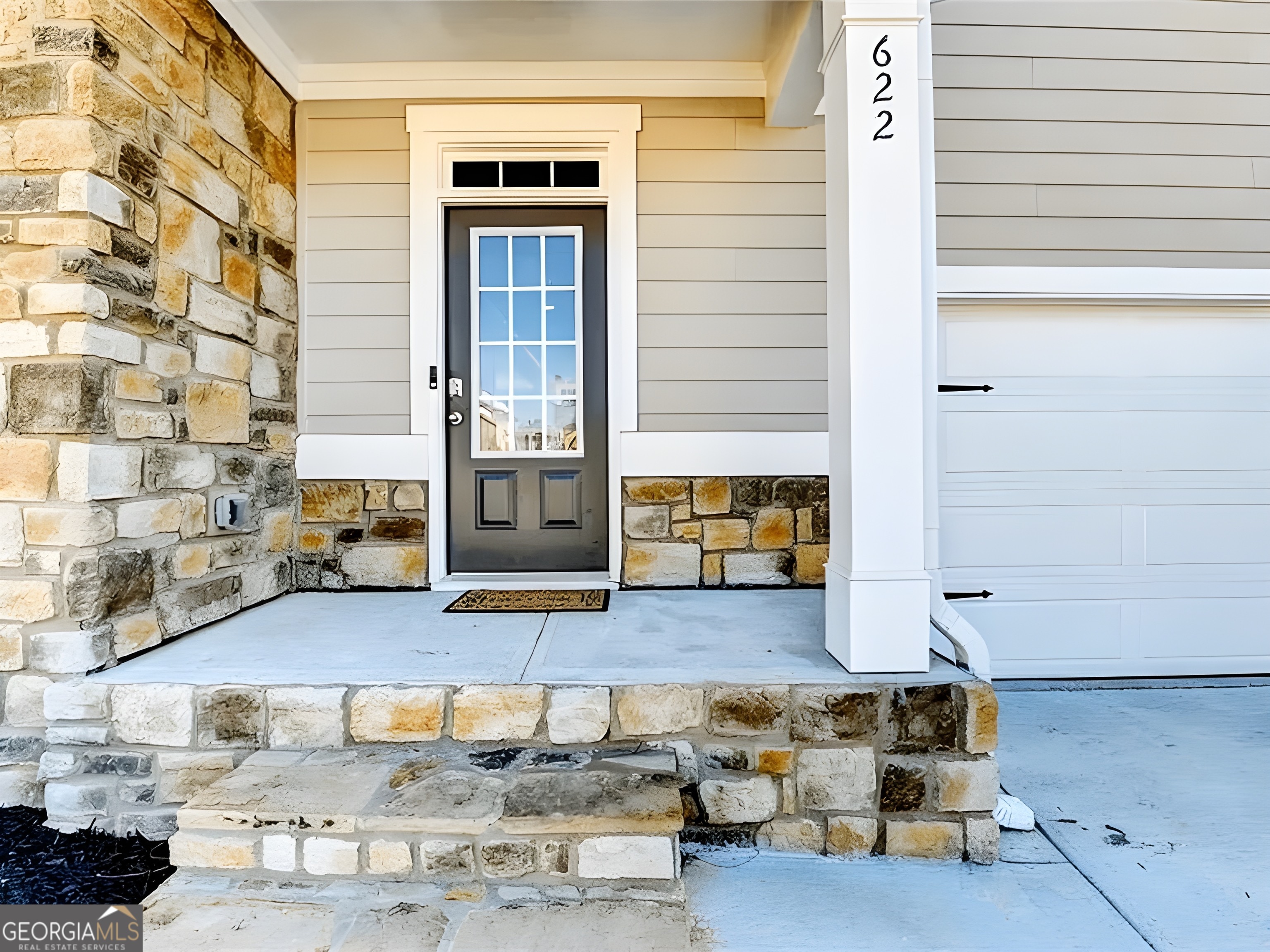 622 Brookfield Drive Braselton, GA 30517 - Photo 2 of 34 a living room with patio furniture