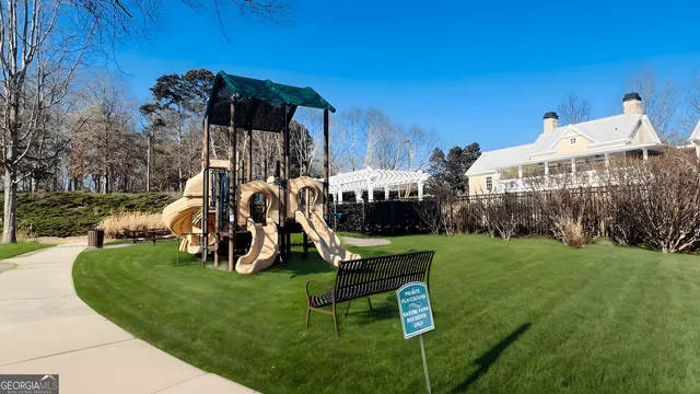 a view of a park with a slide