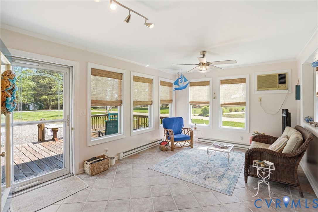 247 Salisbury Park Road Hague, VA 22469 - Photo 15 of 44 a living room with furniture and large windows