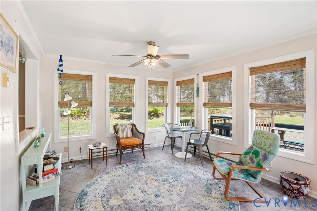 247 Salisbury Park Road Hague, VA 22469 - Photo 17 of 44 a living room with furniture and a large window