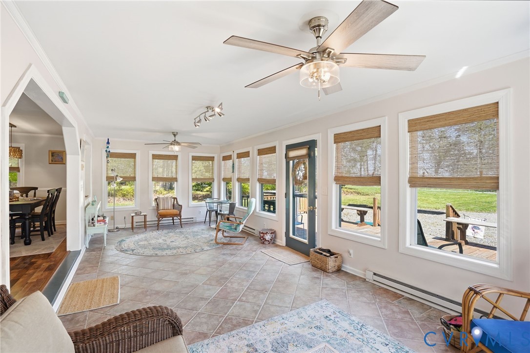 247 Salisbury Park Road Hague, VA 22469 - Photo 18 of 44 a living room with furniture and large windows