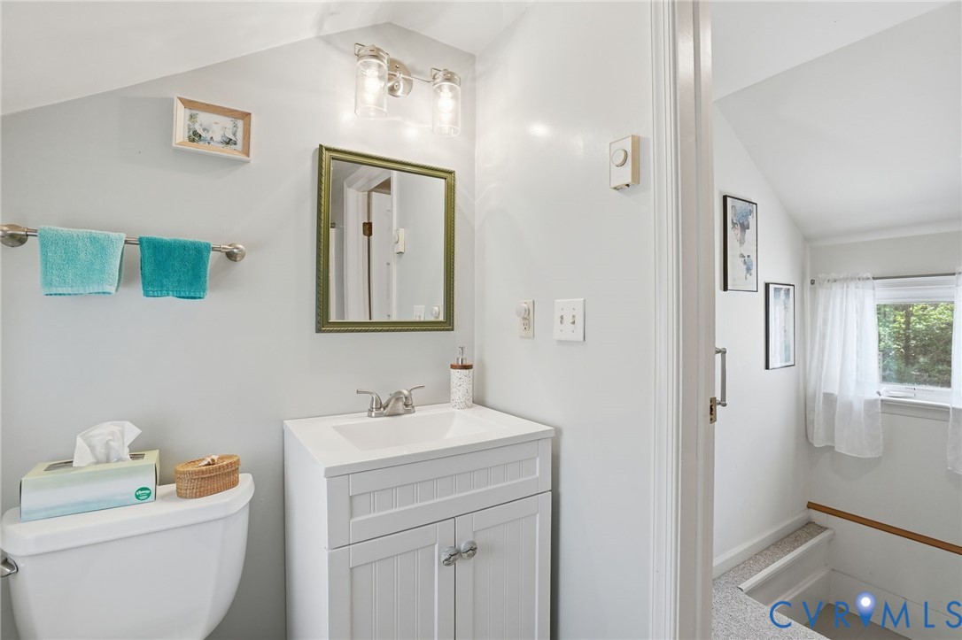 247 Salisbury Park Road Hague, VA 22469 - Photo 26 of 44 a bathroom with a toilet sink and mirror