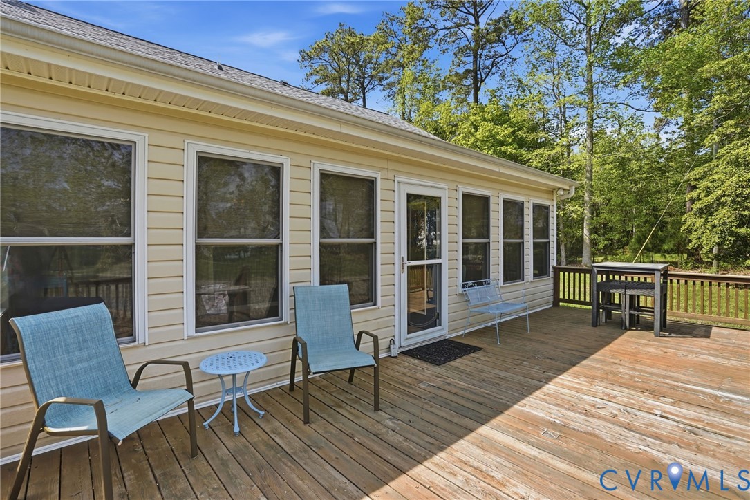 247 Salisbury Park Road Hague, VA 22469 - Photo 32 of 44 a balcony with wooden floor and furniture