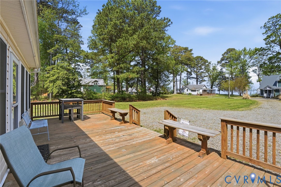 247 Salisbury Park Road Hague, VA 22469 - Photo 33 of 44 a view of a patio with chairs and wooden floor