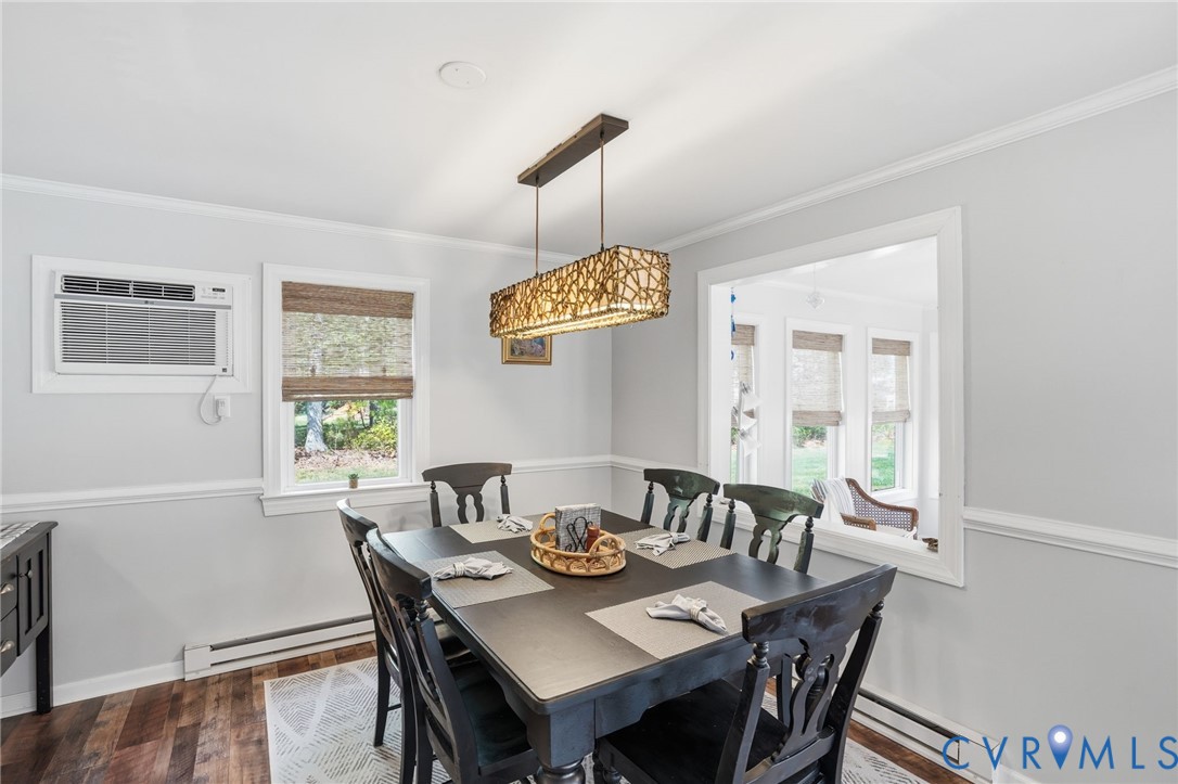 247 Salisbury Park Road Hague, VA 22469 - Photo 8 of 44 a view of a dining room with furniture window and wooden floor