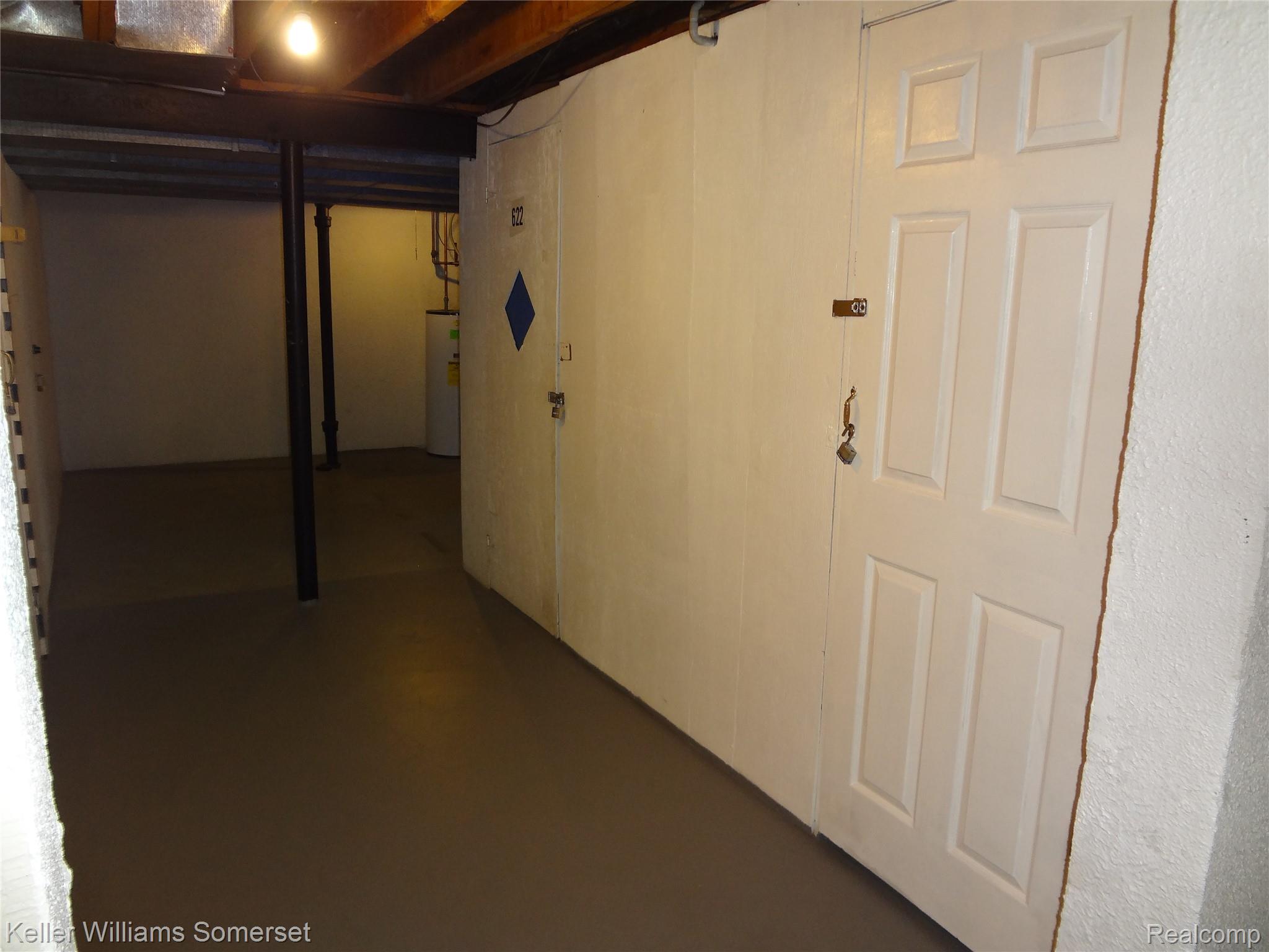 29626 Hoover Road, Unit 626 Warren, MI 48093 - Photo 27 of 35 Below grade area featuring water heater