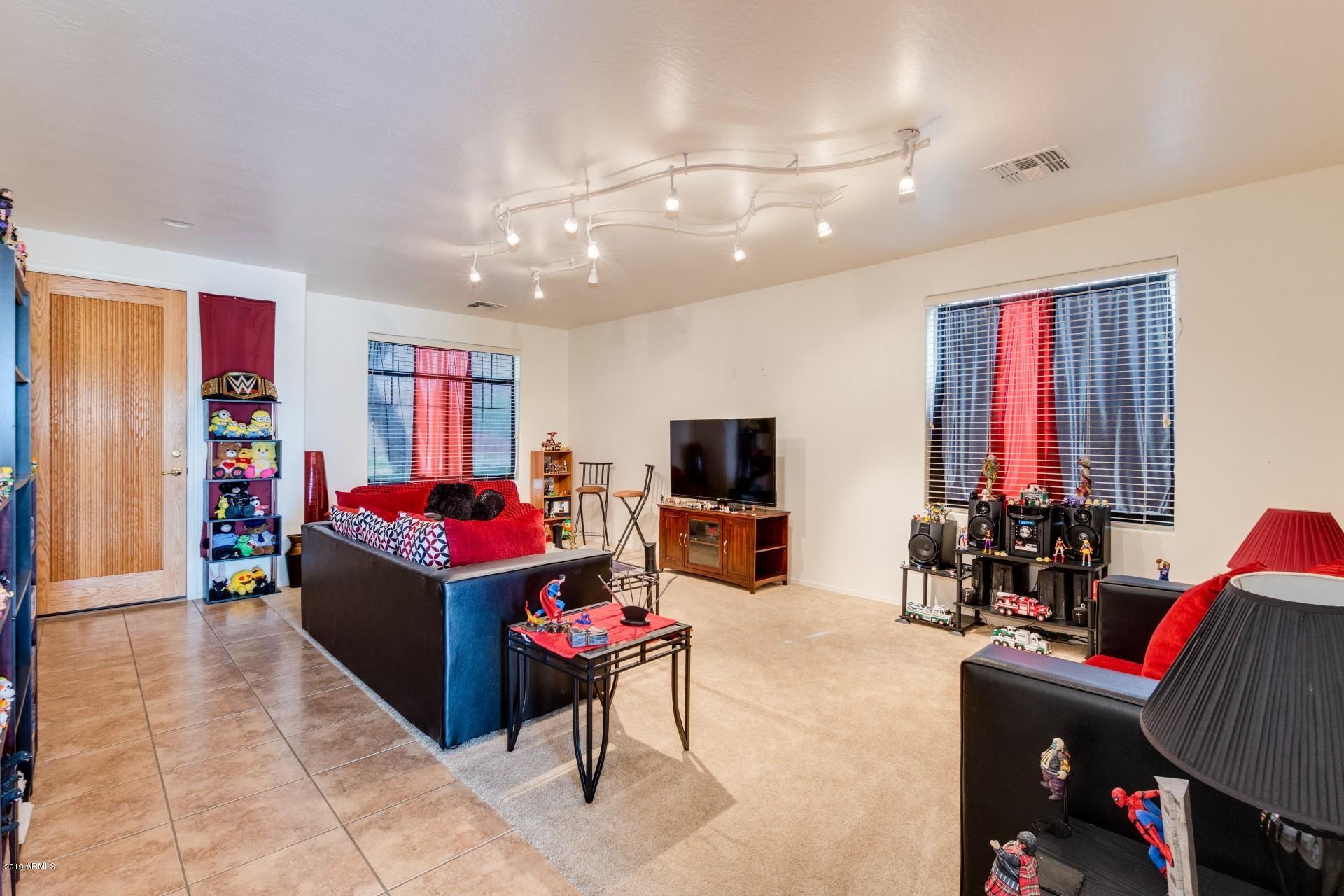 5515 West Carson Road Laveen, AZ 85339 - Photo 11 of 36 Font Living Room