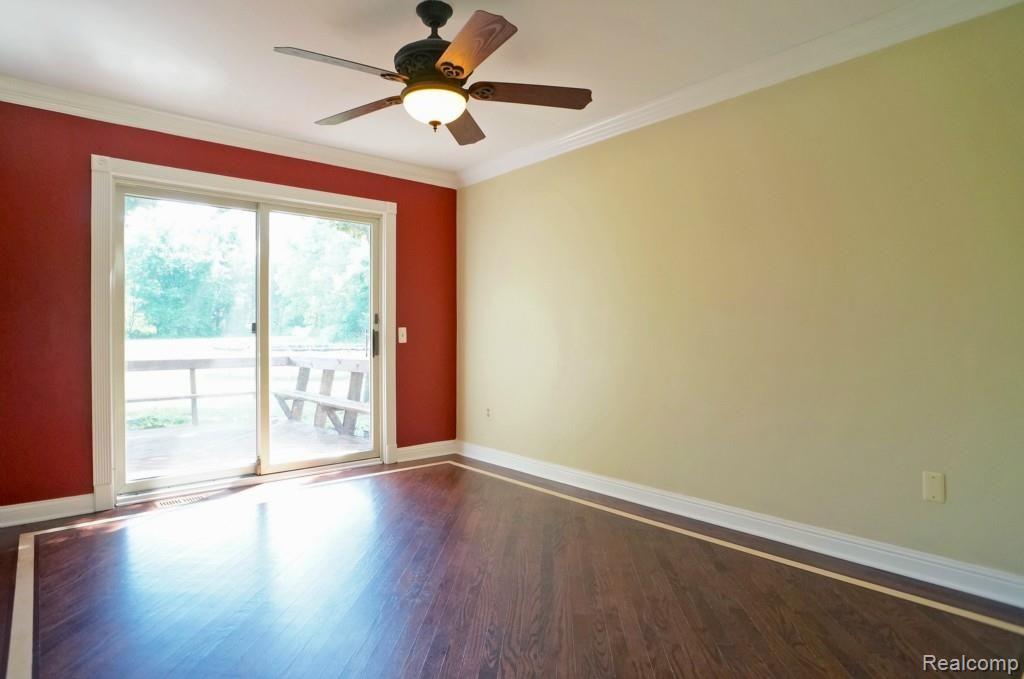 900 East Dawson Road Milford, MI 48381 - Photo 6 of 20 Doorwall to Deck from Large Breakfast Nook