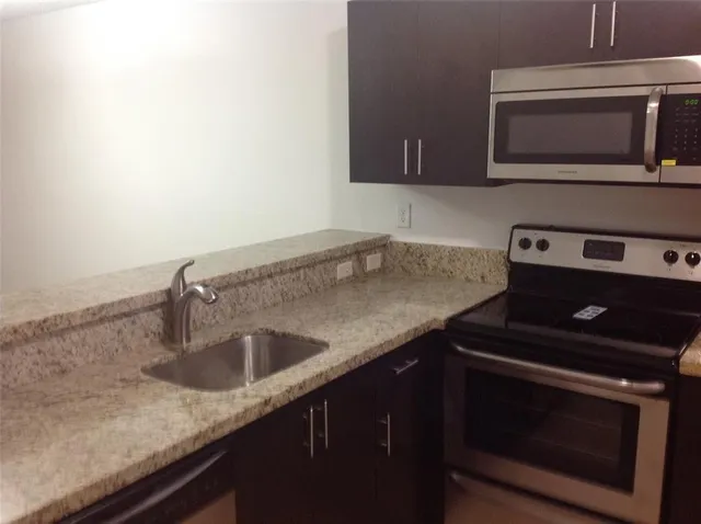 a view of a room that has a window in it