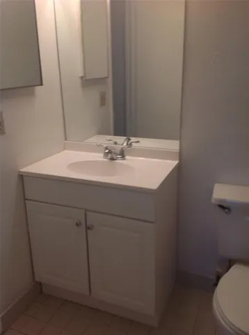 an aerial view of a house with a lake view