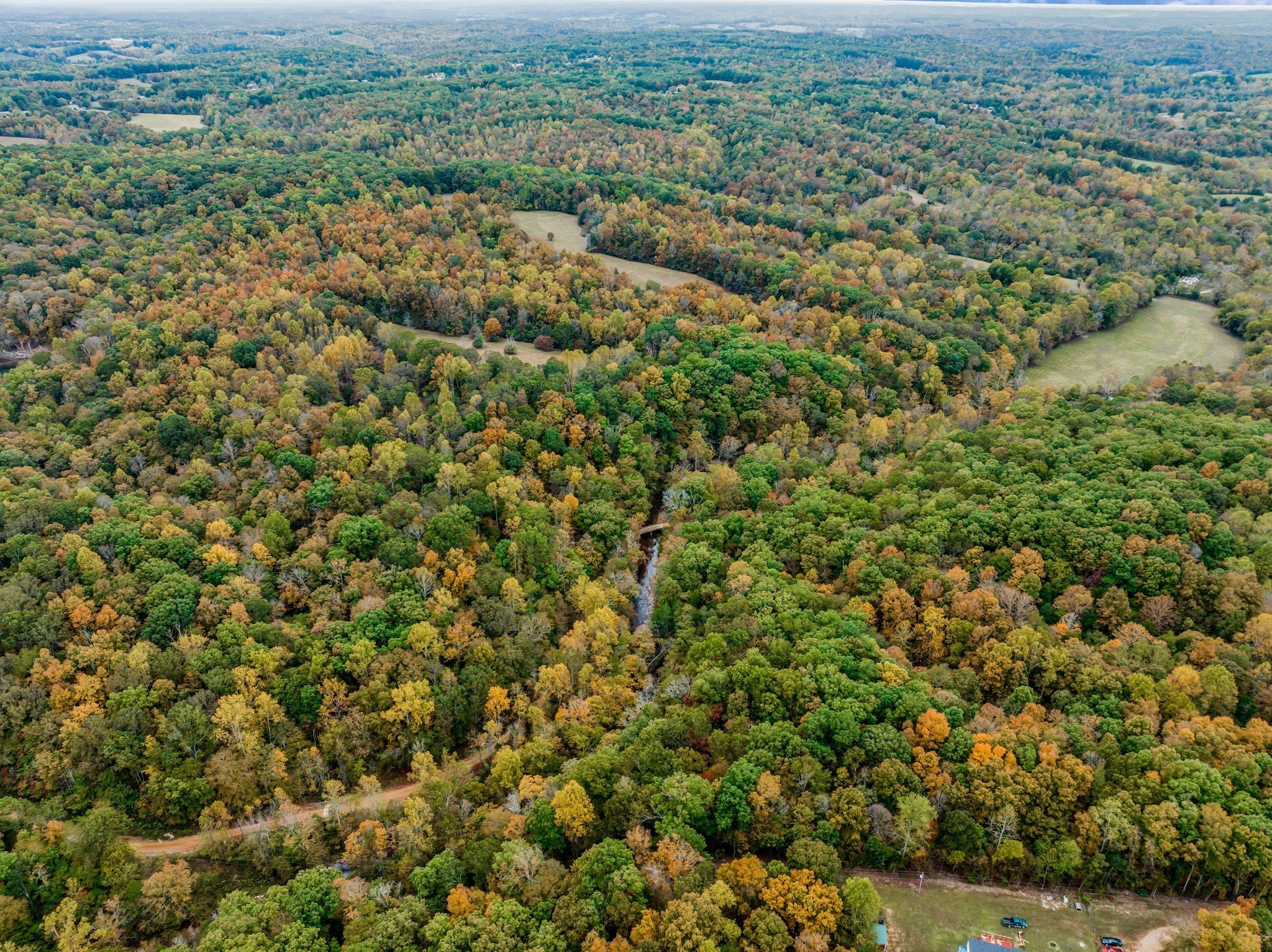 0 Bear Creek Road Bon Aqua, TN 37025 - Photo 25 of 64 an aerial view of a houses with a yard