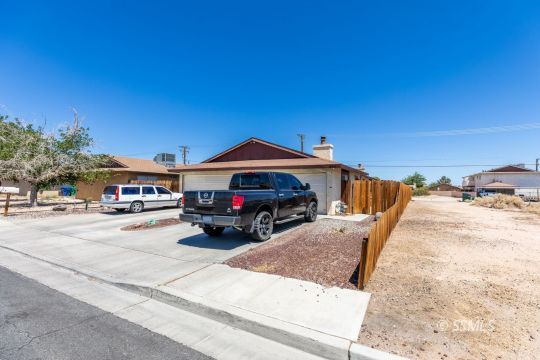 700 Commercial Avenue Ridgecrest, CA 93555 - Photo 2 of 10 a view of a street with cars