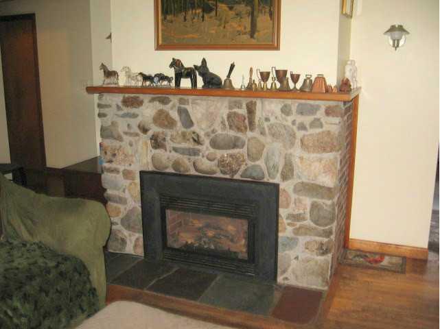 28 Oakland Road Fairfield, ME 04937 - Photo 5 of 21 Living Room. with gas fireplace