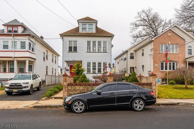 a car parked in front of a house