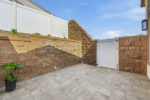 a view of a terrace with yard