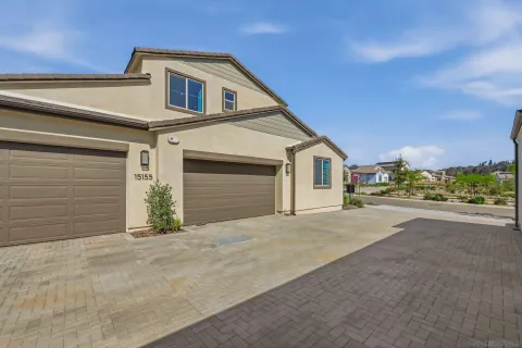 a front view of a house with a garage