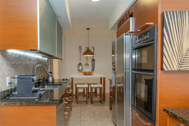 a bedroom with a bed and a mirror