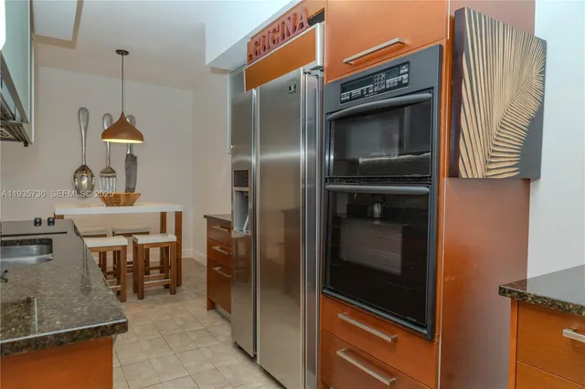a bathroom with a toilet sink and shower