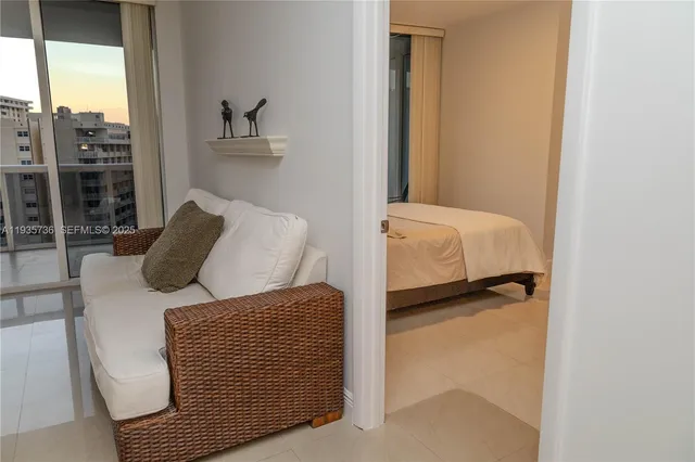 a bathroom with a granite countertop sink double and mirror