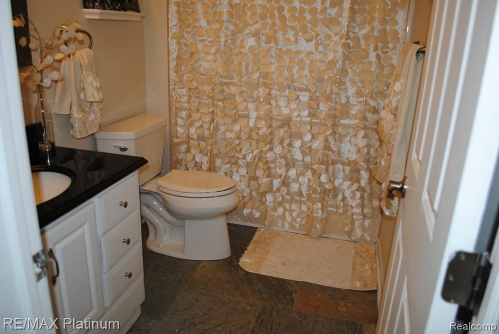 4416 McGunn Road Howell, MI 48843 - Photo 21 of 38 Main Floor Bathroom