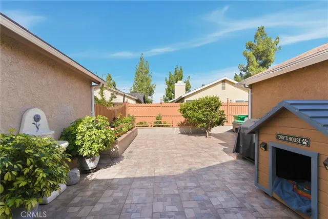a front view of a house with a yard and a garage