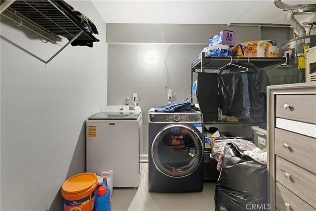 an aerial view of residential house with outdoor space and parking