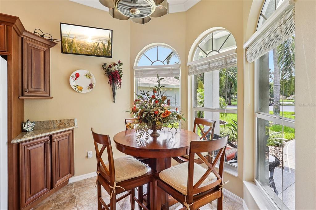 2512 Baywater Road Tavares, FL 32778 - Photo 20 of 75 a view of a dining room with furniture a livingroom and chandelier