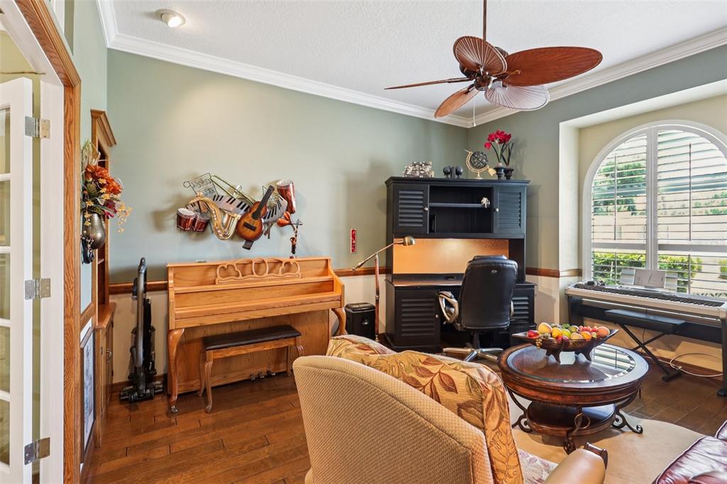 2512 Baywater Road Tavares, FL 32778 - Photo 23 of 75 a bedroom with furniture and a window