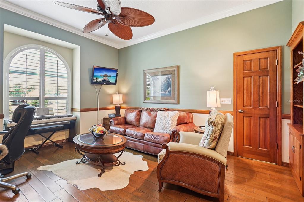 2512 Baywater Road Tavares, FL 32778 - Photo 24 of 75 a living room with furniture and a large window