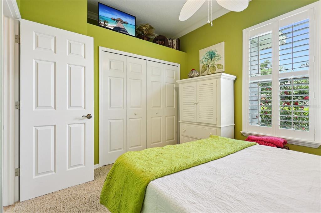 2512 Baywater Road Tavares, FL 32778 - Photo 31 of 75 a bedroom with a bed closet and a window