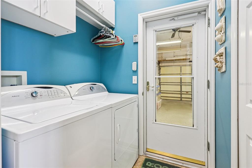 2512 Baywater Road Tavares, FL 32778 - Photo 33 of 75 a utility room with dryer and washer