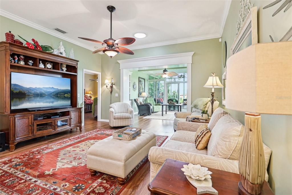 2512 Baywater Road Tavares, FL 32778 - Photo 5 of 75 a living room with furniture and a flat screen tv