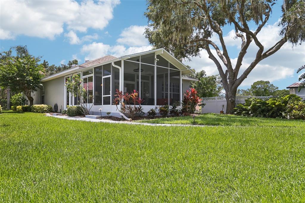2512 Baywater Road Tavares, FL 32778 - Photo 51 of 75 a front view of house with yard and green space