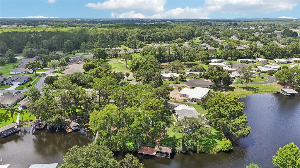 2512 Baywater Road Tavares, FL 32778 - Photo 71 of 75 an aerial view of residential house with outdoor space and swimming pool