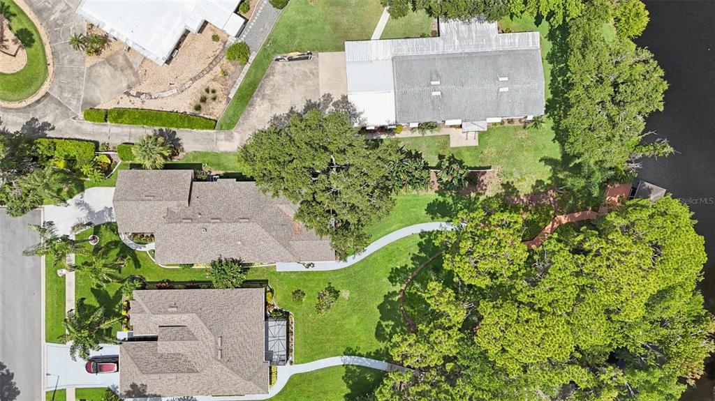 2512 Baywater Road Tavares, FL 32778 - Photo 72 of 75 an aerial view of a house with a garden
