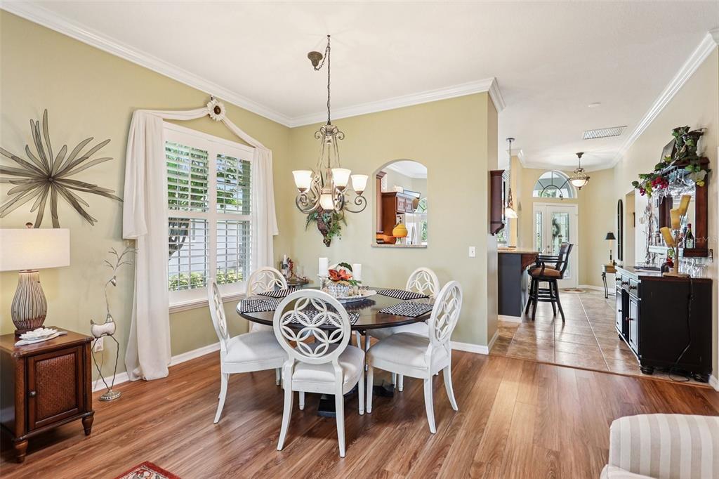2512 Baywater Road Tavares, FL 32778 - Photo 9 of 75 a view of a dining room with furniture window and wooden floor