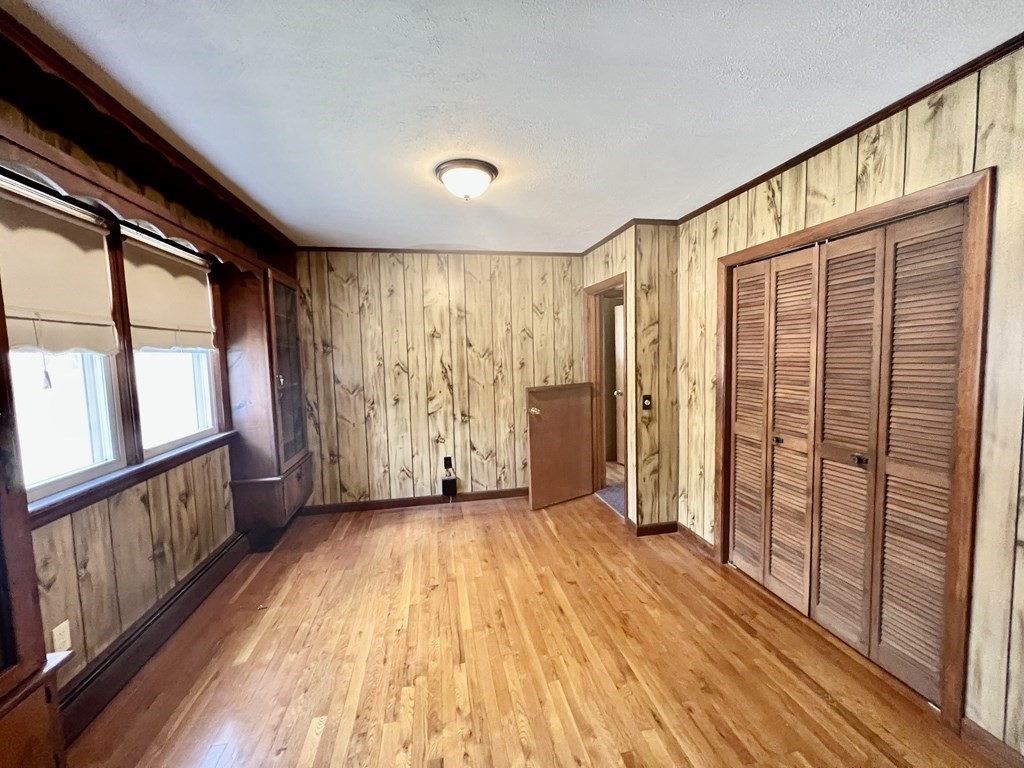 44 Burlingame Road Charlton, MA 01507 - Photo 13 of 29 a view of hallway with wooden floor and stairs