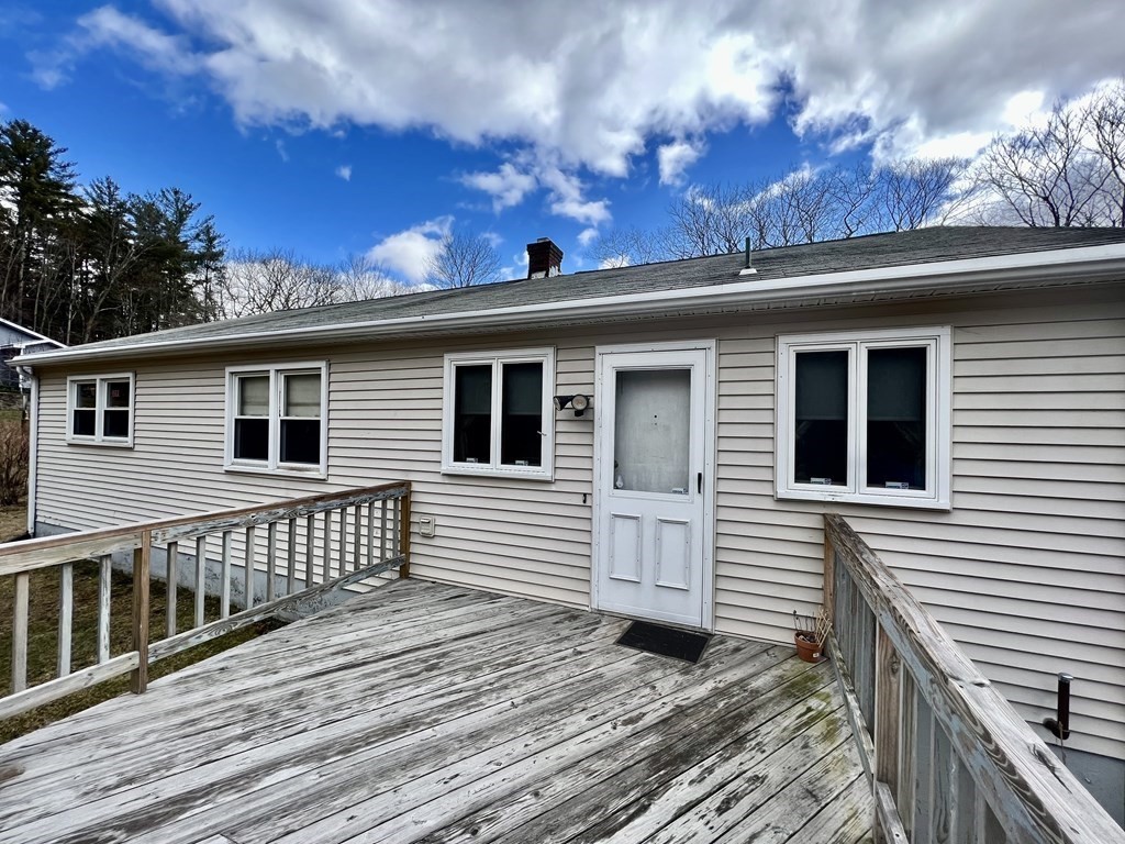 44 Burlingame Road Charlton, MA 01507 - Photo 20 of 29 a view of a house with a balcony