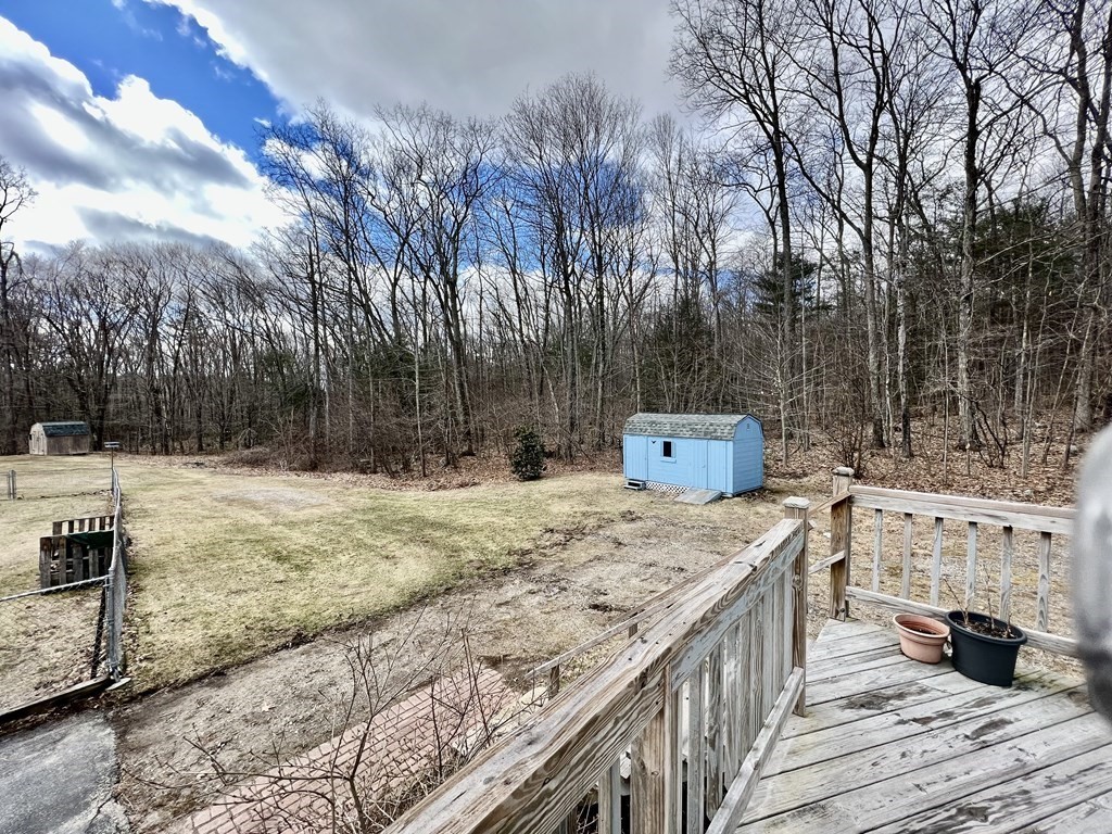 44 Burlingame Road Charlton, MA 01507 - Photo 23 of 29 a view of a backyard with wooden fence