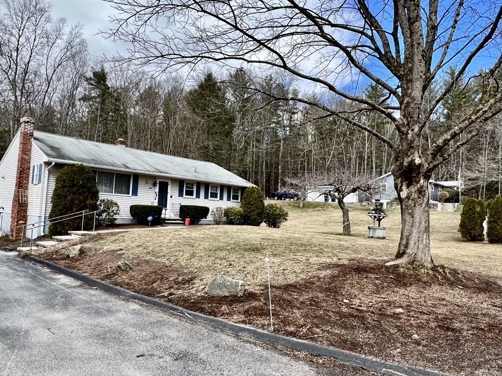 44 Burlingame Road Charlton, MA 01507 - Photo 28 of 29 a view of a house with snow on the side of the road