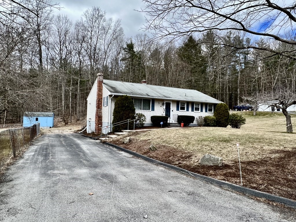 44 Burlingame Road Charlton, MA 01507 - Photo 29 of 29 a front view of a house with a yard
