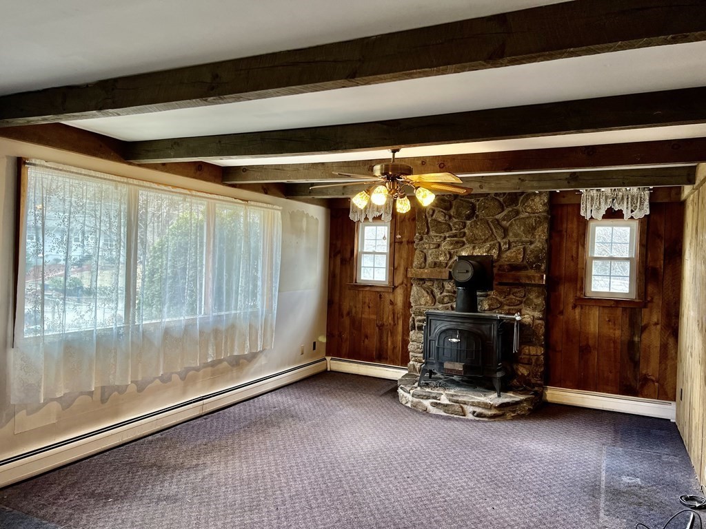 44 Burlingame Road Charlton, MA 01507 - Photo 6 of 29 a view of a room with gym equipment