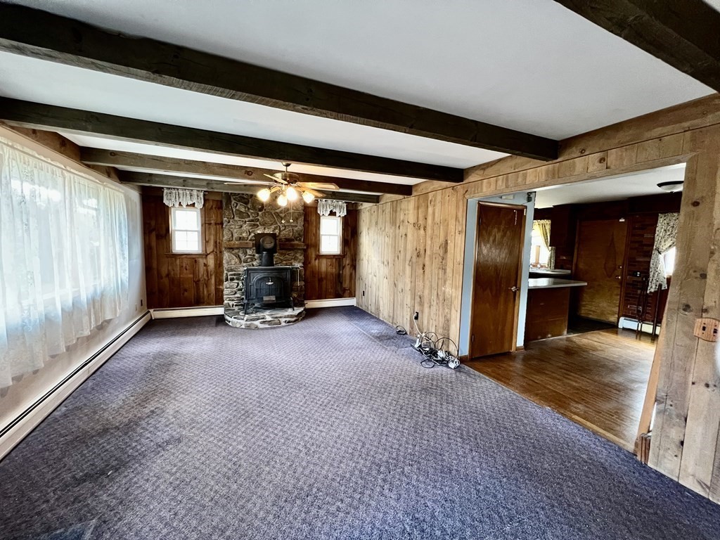 44 Burlingame Road Charlton, MA 01507 - Photo 10 of 29 a view of a hallway with seating area