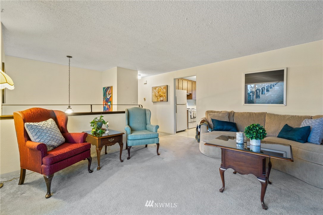 22508 3rd Place West Bothell, WA 98021 - Photo 12 of 23 a living room with furniture and a rug