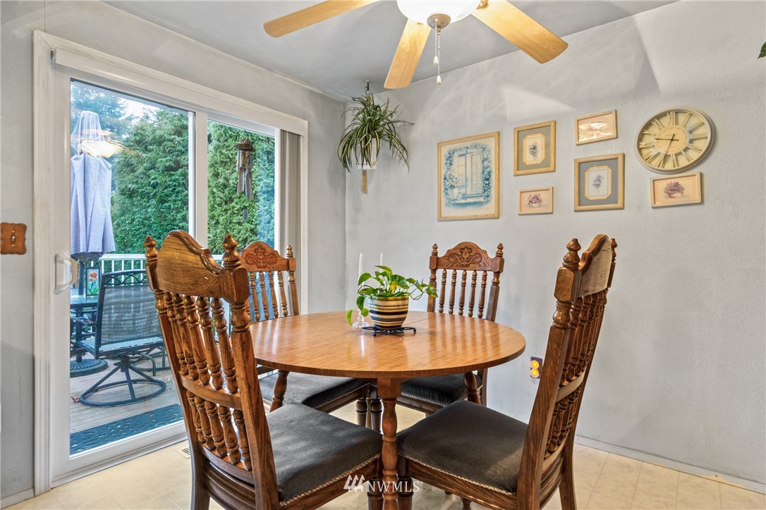 22508 3rd Place West Bothell, WA 98021 - Photo 16 of 23 a view of a dining room with furniture window and wooden floor