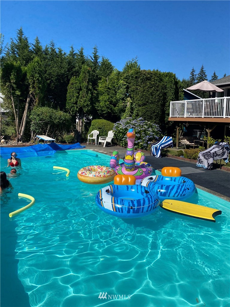 22508 3rd Place West Bothell, WA 98021 - Photo 3 of 23 a view of a play ground with swimming pool