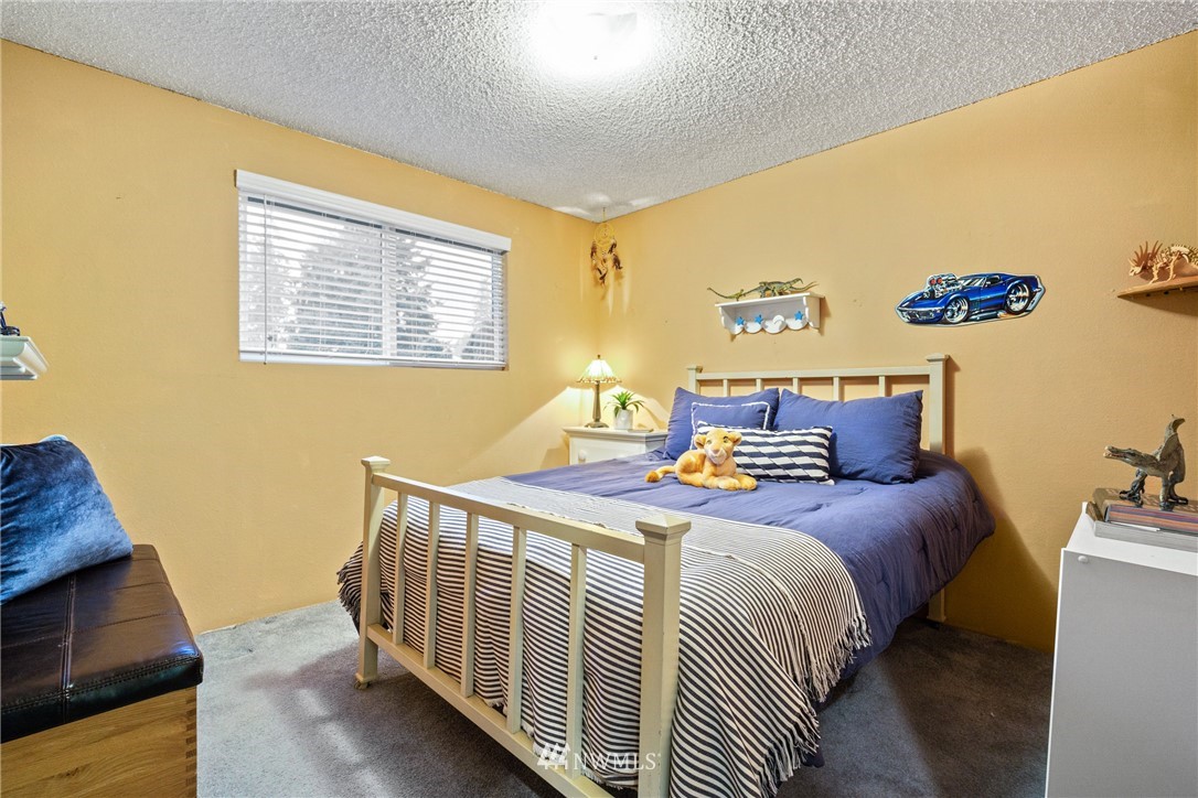 22508 3rd Place West Bothell, WA 98021 - Photo 8 of 23 a bedroom with a bed and a window
