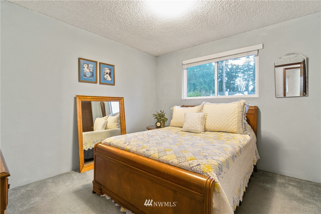22508 3rd Place West Bothell, WA 98021 - Photo 9 of 23 a bedroom with bed and window