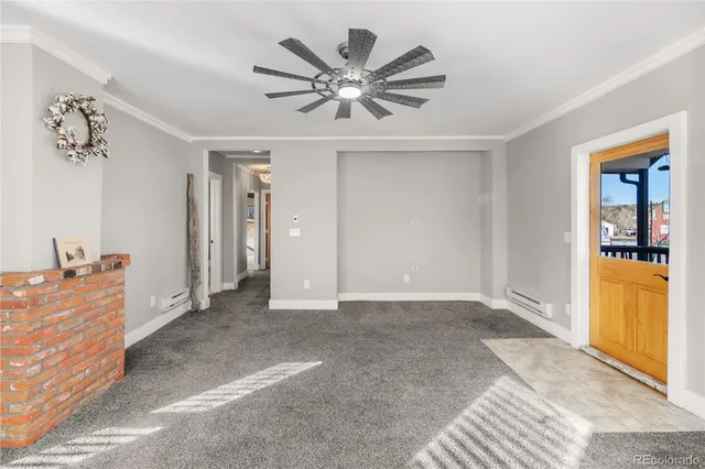 a view of work space with a ceiling fan